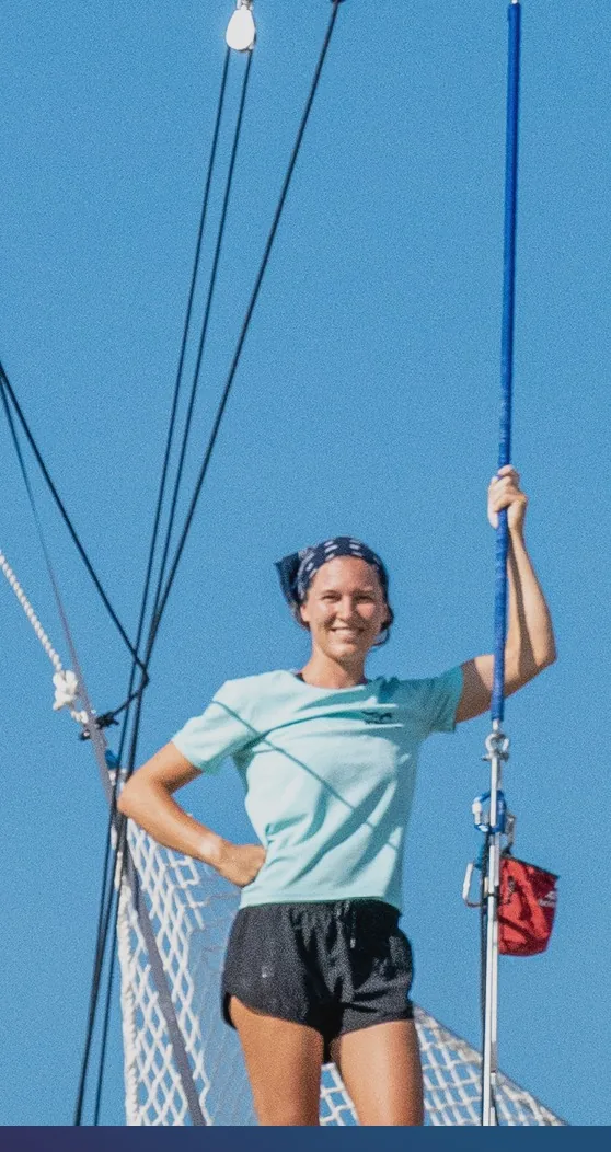Coach standing on the double-wide pedestal board — MACA academy Phuket — MACA flying trapeze rig